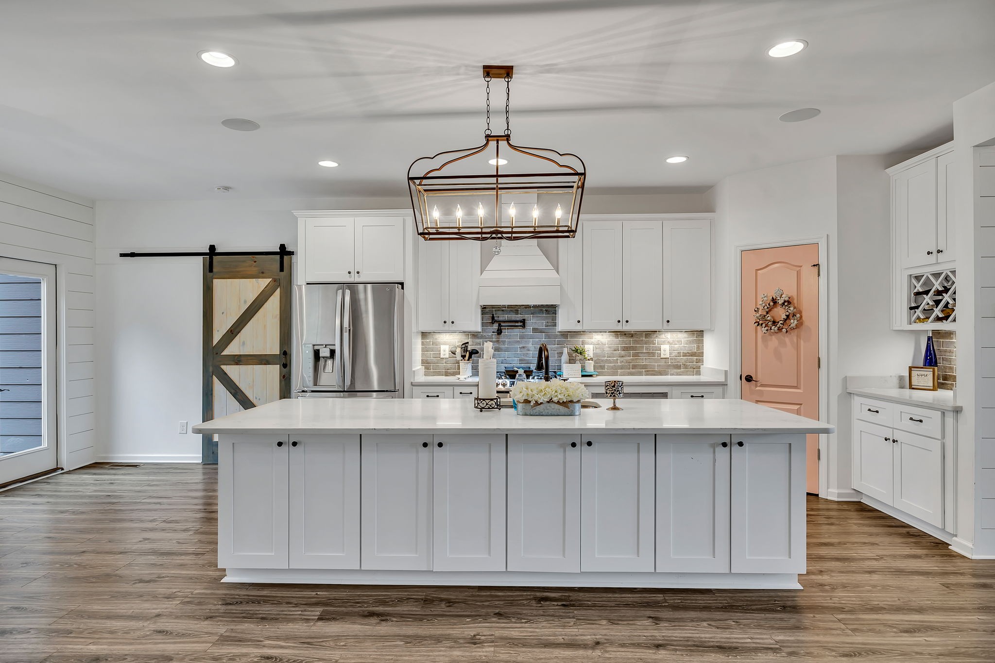 1349 Cliff Amos Road Spring Hill, TN 37174 - Photo 8 of 48 a kitchen with stainless steel appliances granite countertop a sink window and cabinets
