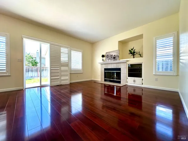 a kitchen with stainless steel appliances a stove a microwave and sink