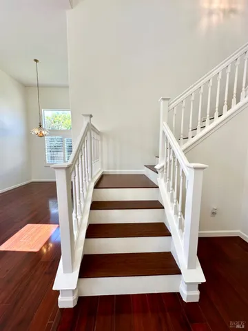 a view of entryway with wooden floor
