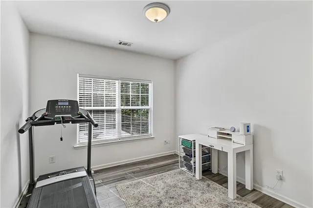 a dining room with furniture window wooden floor