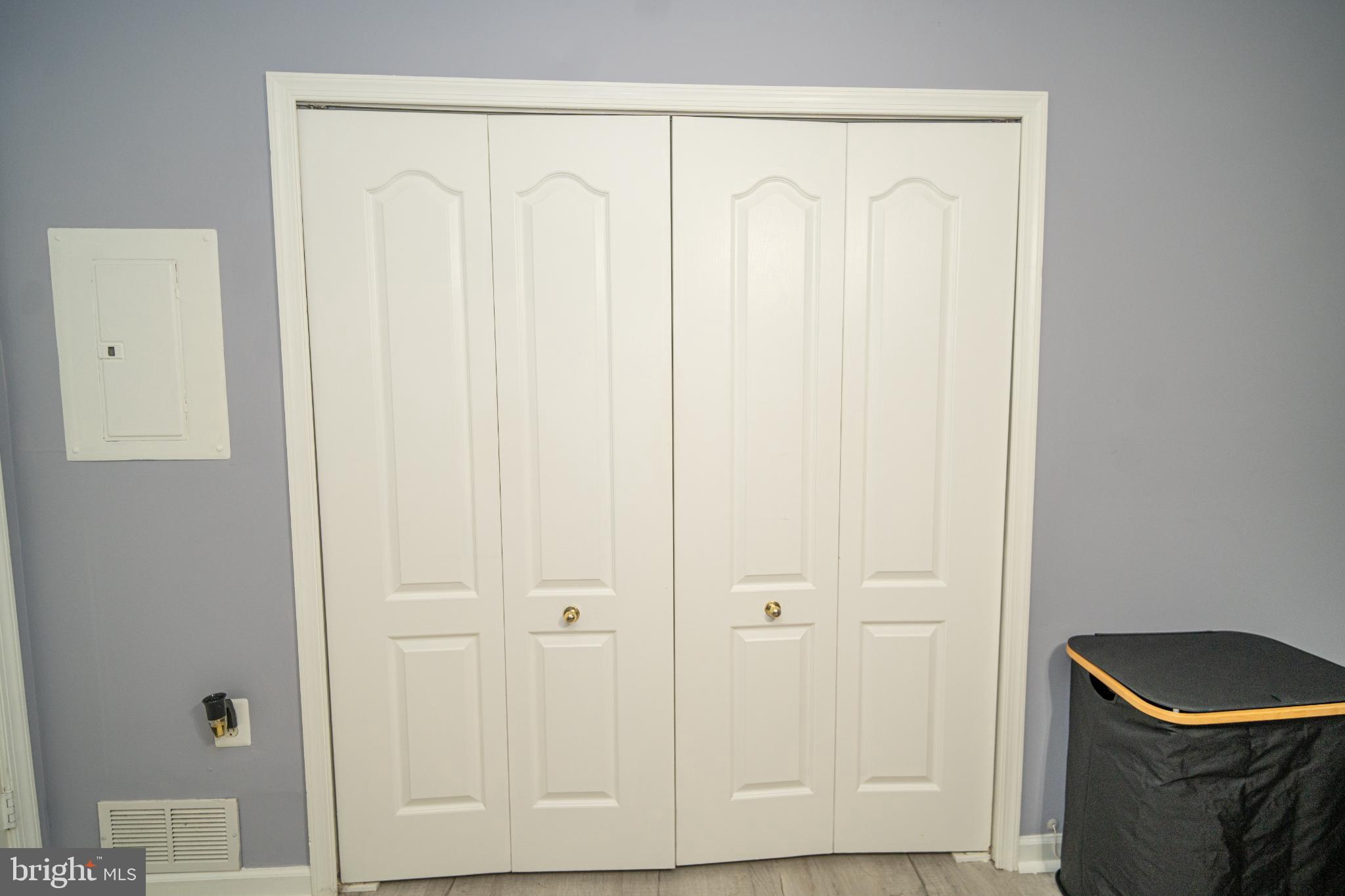 8911 Town Center Circle, Unit 4102 Upper Marlboro, MD 20774 - Photo 13 of 16 a bathroom with a granite countertop sink and a shower