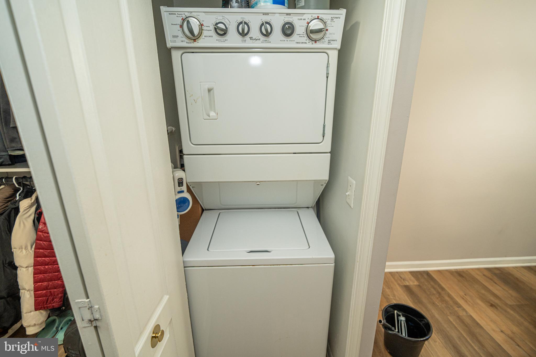 8911 Town Center Circle, Unit 4102 Upper Marlboro, MD 20774 - Photo 15 of 16 a utility room with dryer and washer