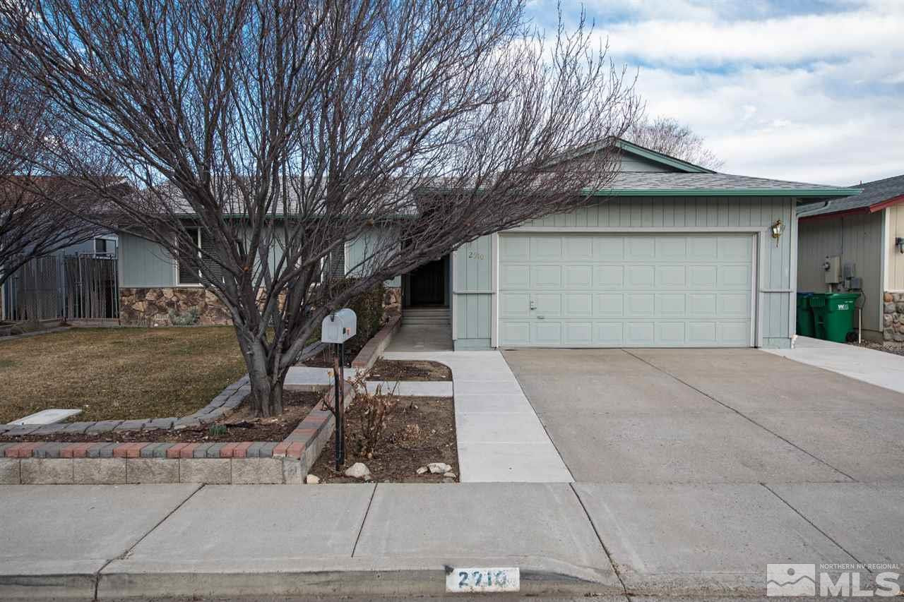 2910 Severn Drive Reno, NV 89503 - Photo 1 of 23 a front view of a house with a yard and garage