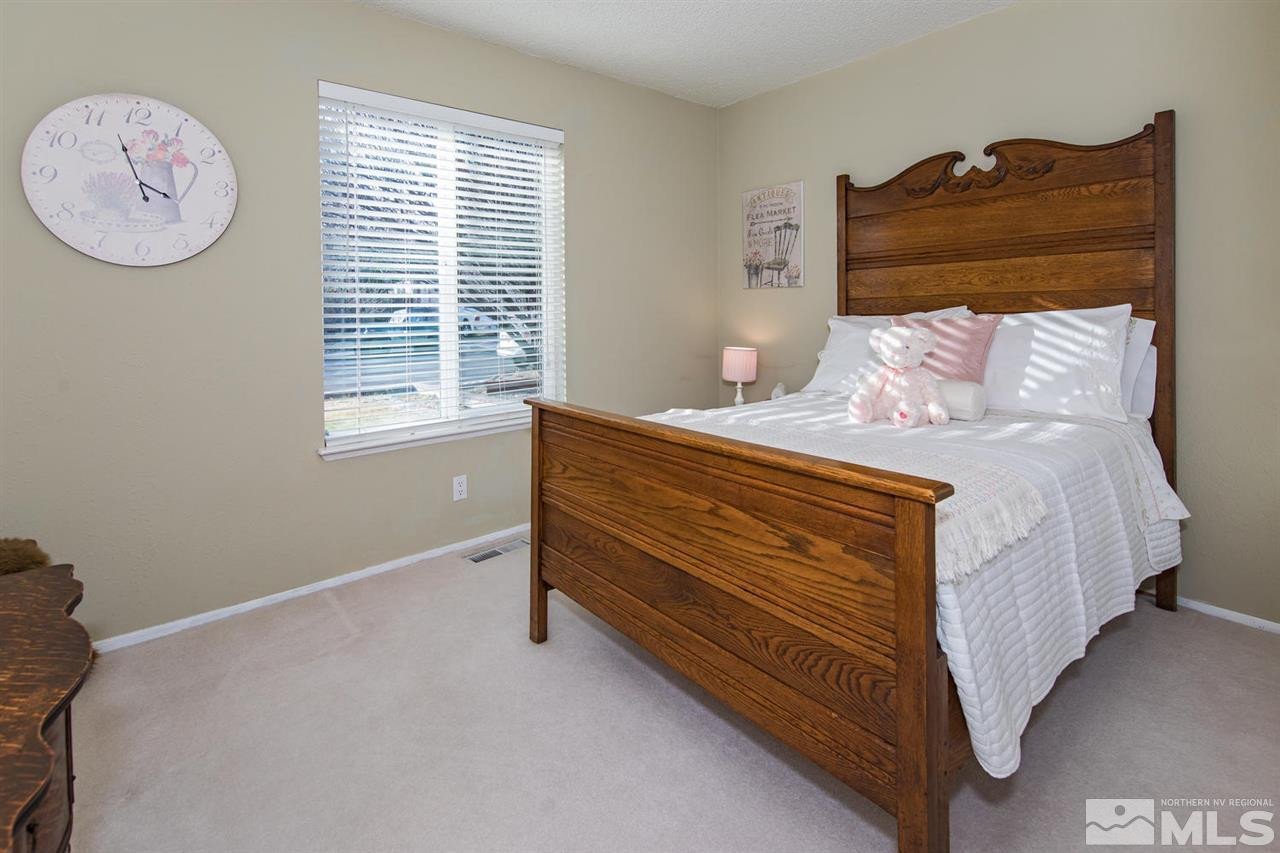 2910 Severn Drive Reno, NV 89503 - Photo 14 of 23 a bedroom with a bed and a window