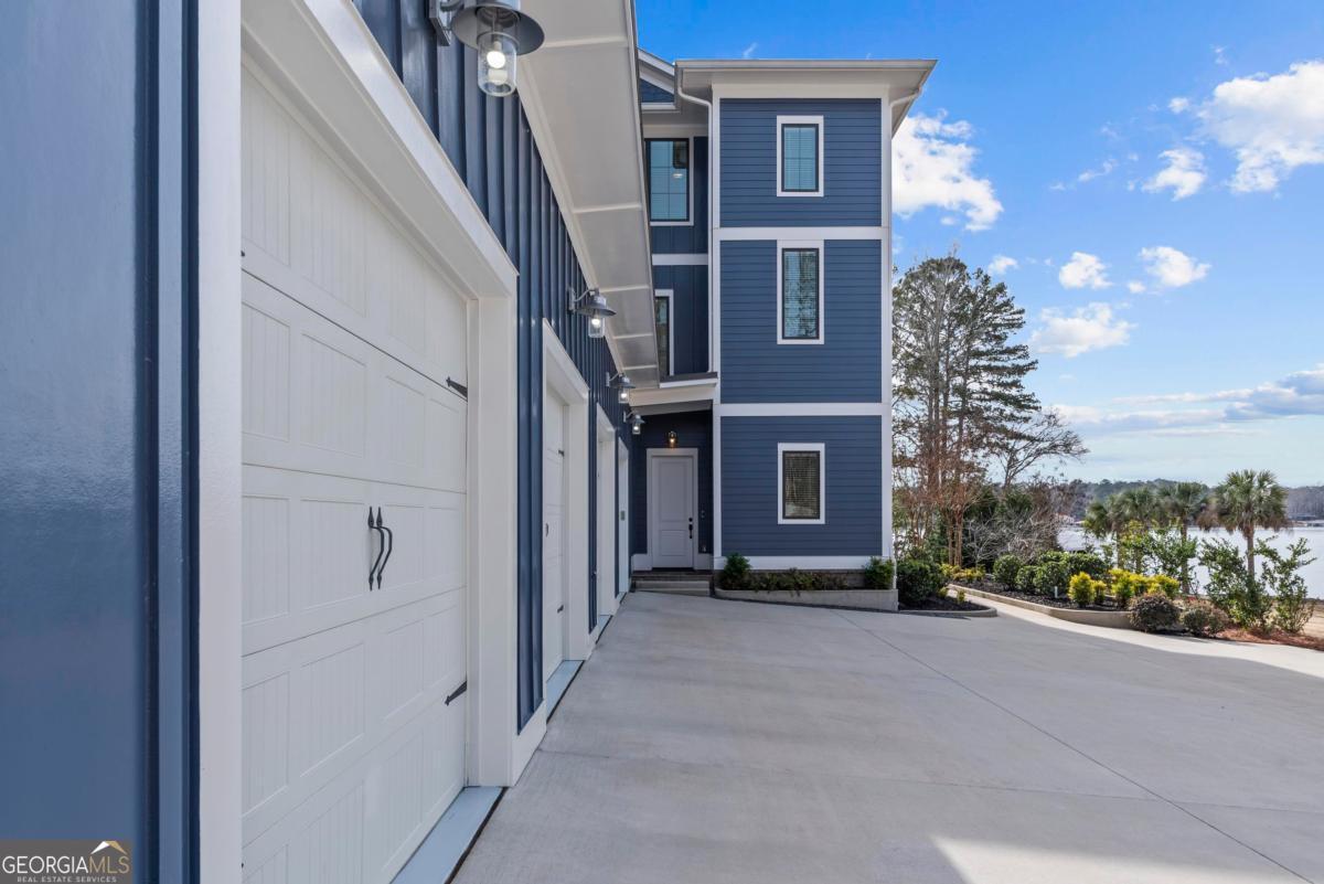 312 Cold Branch Road Eatonton, GA 31024 - Photo 11 of 75 a view of a house with a yard