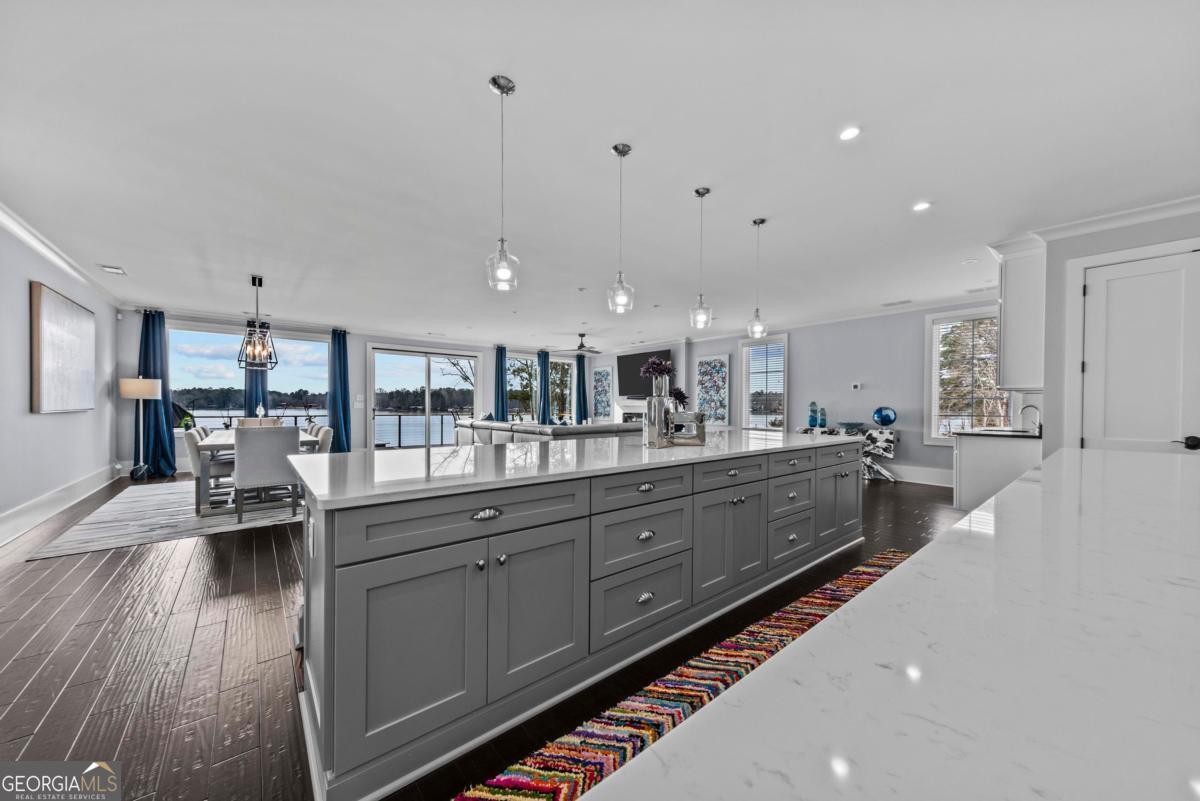 312 Cold Branch Road Eatonton, GA 31024 - Photo 29 of 75 a large living room with stainless steel appliances granite countertop lots of counter top space