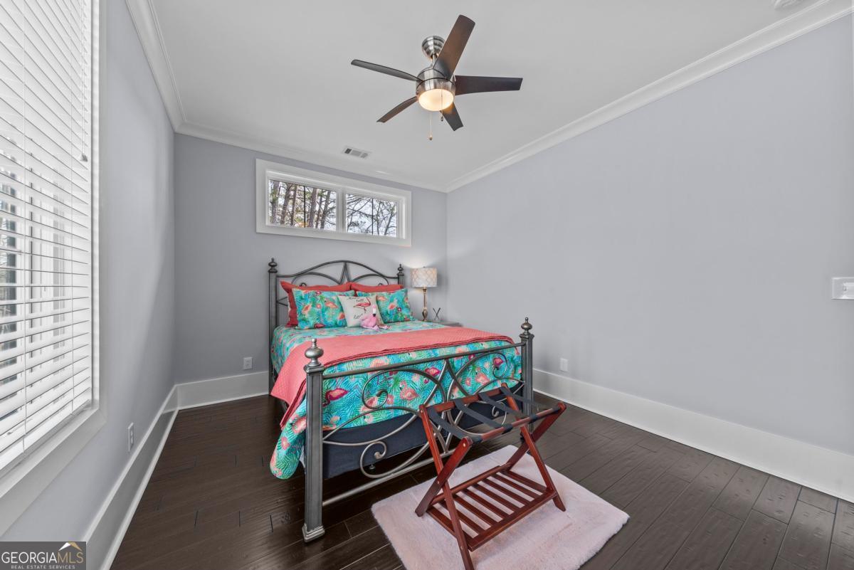 312 Cold Branch Road Eatonton, GA 31024 - Photo 60 of 75 a bedroom with a bed and a window
