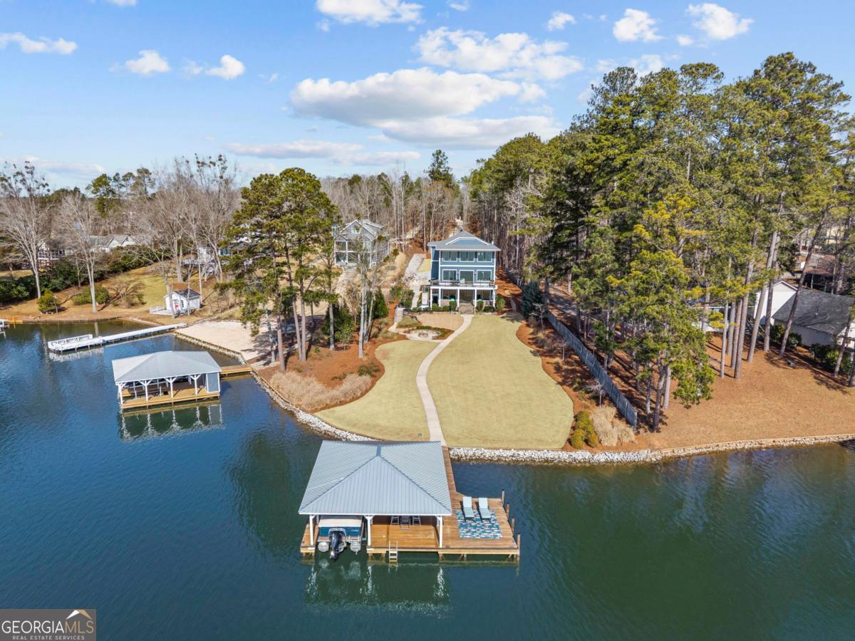 312 Cold Branch Road Eatonton, GA 31024 - Photo 7 of 75 a view of a swimming pool with outdoor seating