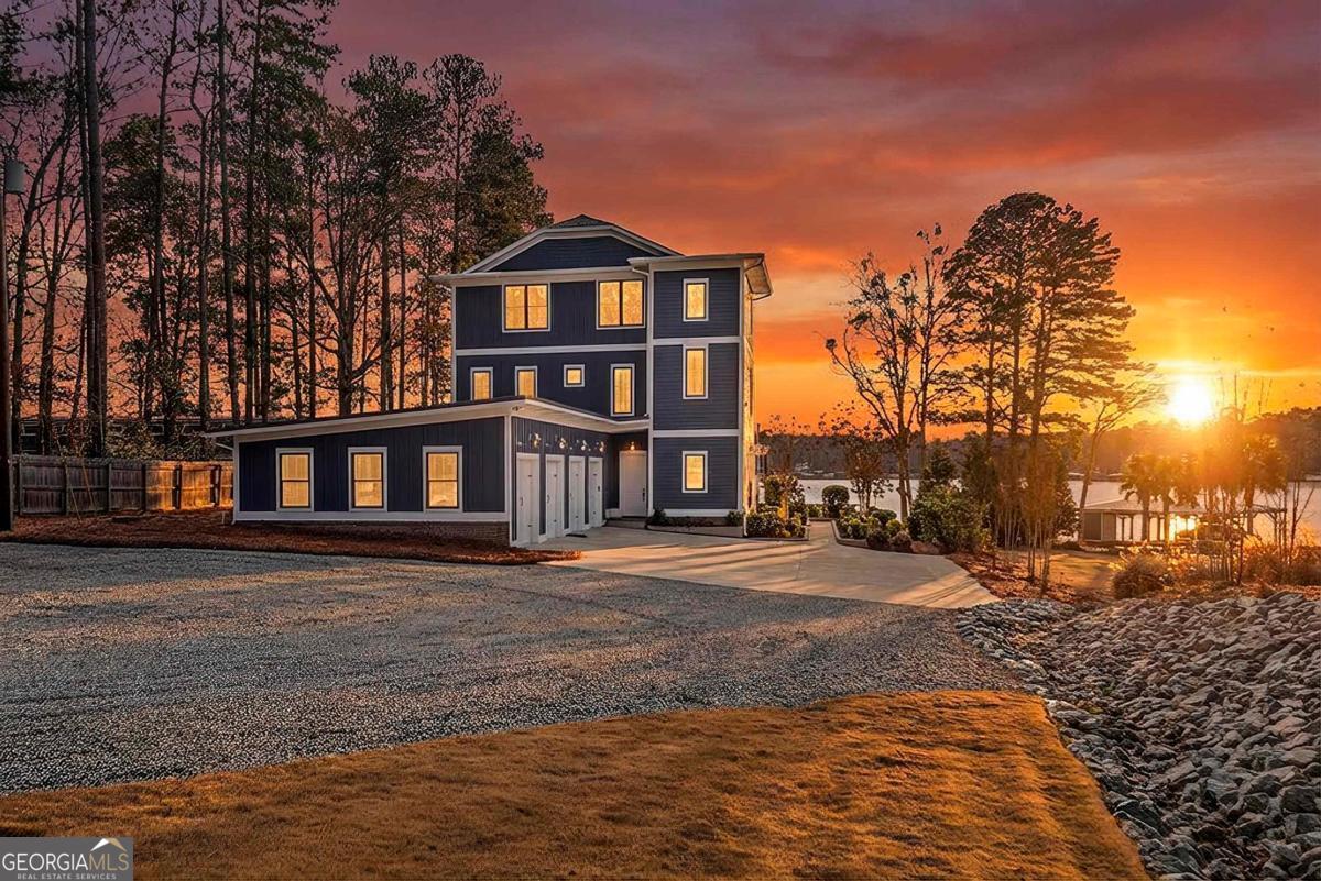 312 Cold Branch Road Eatonton, GA 31024 - Photo 75 of 75 a front view of a house with a yard