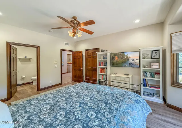 a bathroom with a sink toilet and a mirror