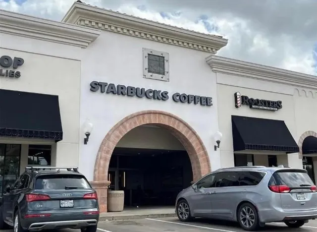 a car parked in front of a building
