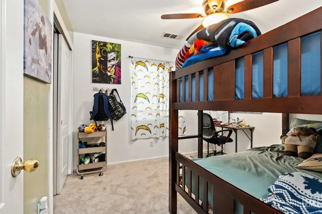 a view of a living room and dining room