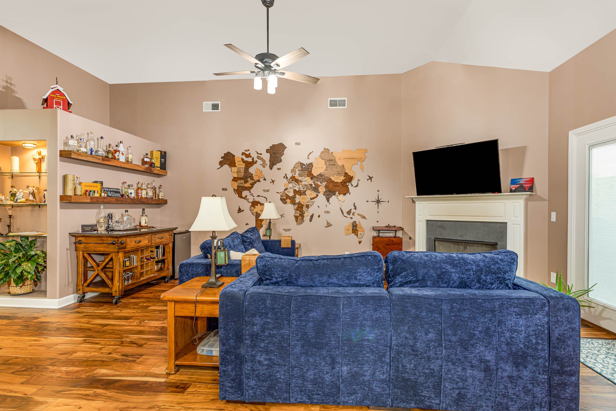 5680 Cane Ridge Road Antioch, TN 37013 - Photo 3 of 28 a living room with fireplace furniture and a flat screen tv