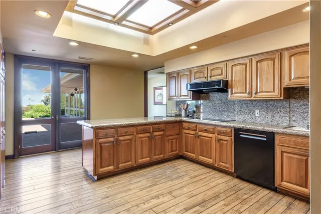 a bedroom with furniture and a fireplace