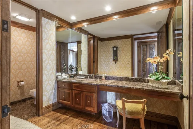 a utility room with sink dryer and washer