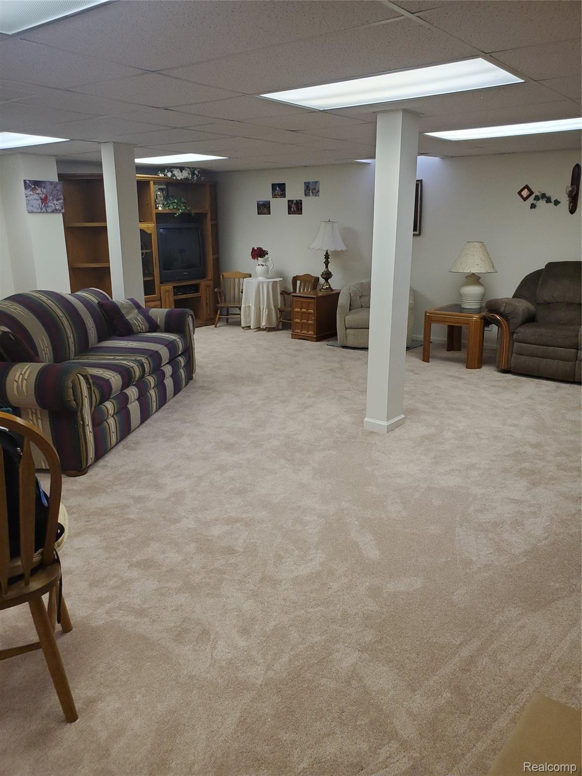 428 Lilly View Court Howell, MI 48843 - Photo 25 of 38 Lower family room