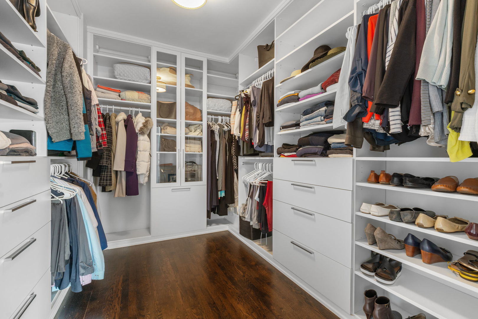 1507 South Prairie Avenue Chicago, IL 60605 - Photo 15 of 25 a view of walk in closet with clothes and shoes