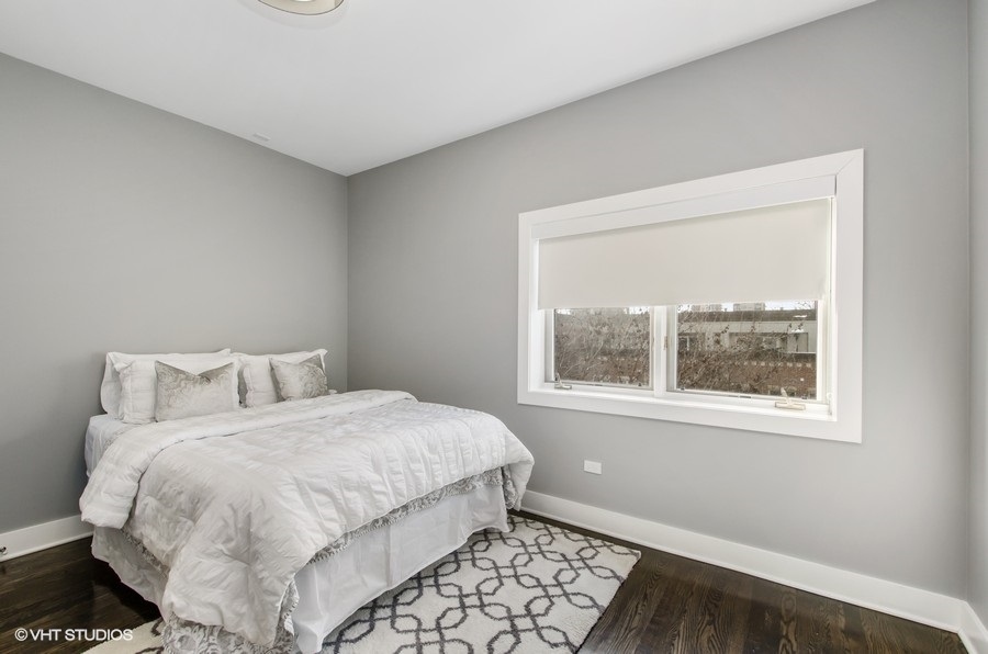 1507 South Prairie Avenue Chicago, IL 60605 - Photo 16 of 25 a bedroom with a bed and a window