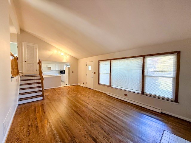 363 Maple Street Glen Ellyn, IL 60137 - Photo 3 of 17 a view of an empty room with wooden floor and a window