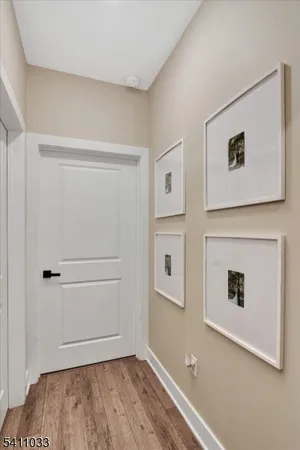 a view of a hallway with closet
