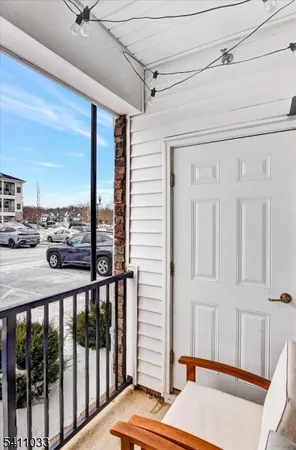 a view of balcony and wooden floor