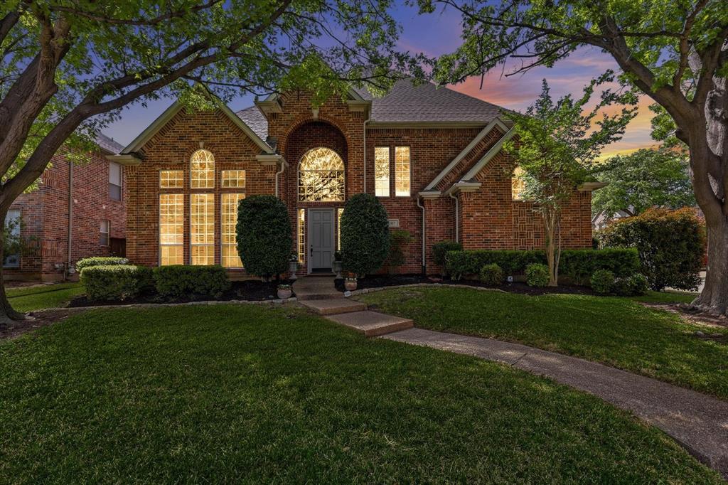 117 Portside Lane Coppell, TX 75019 - Photo 29 of 37 Beautiful curb appeal night and day!