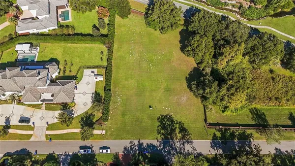 a view of outdoor space with garden and trees