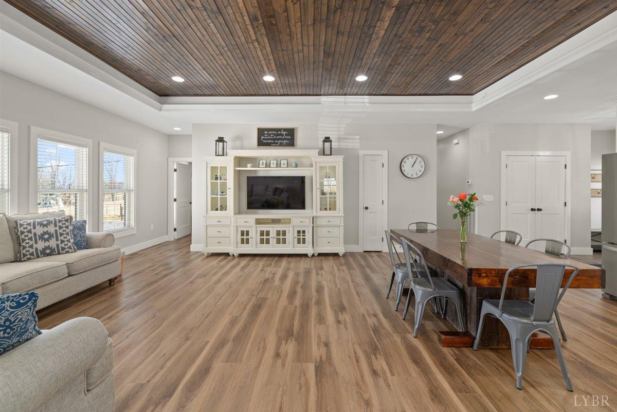 4639 Lowry Road Goode, VA 24556 - Photo 14 of 76 a living room with furniture and a flat screen tv