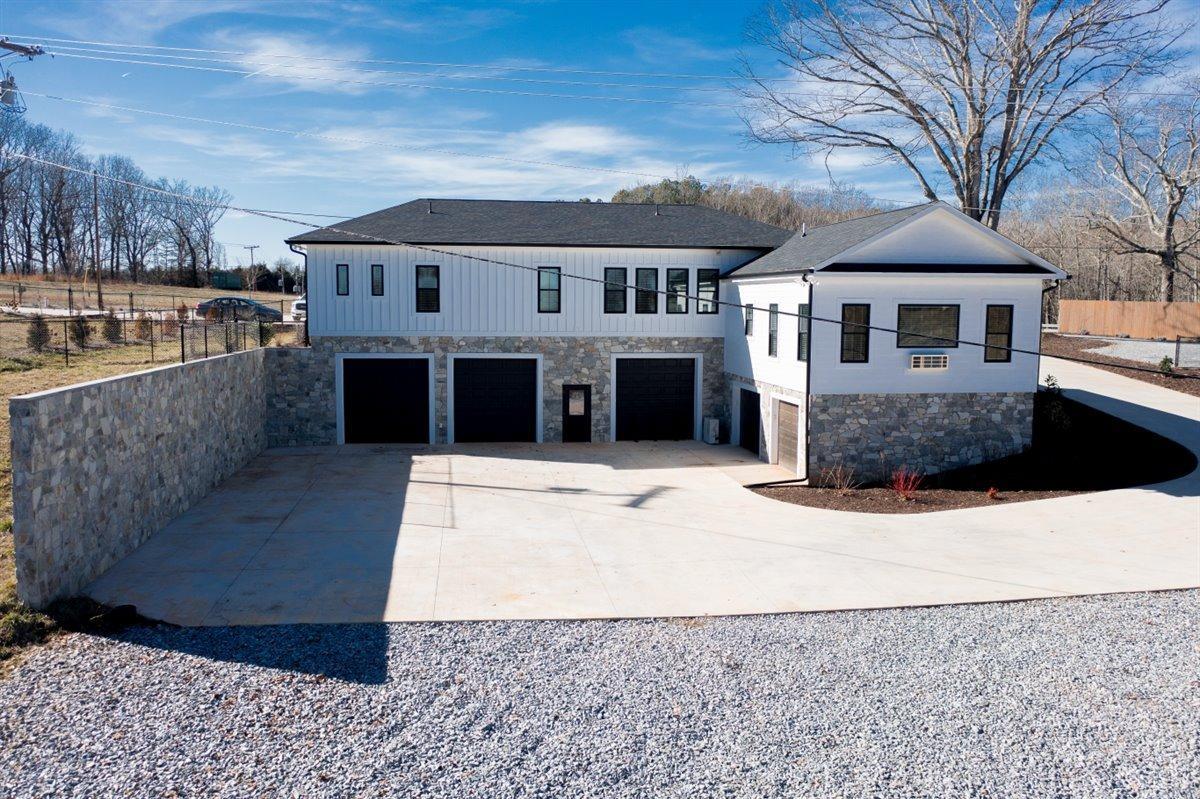 4639 Lowry Road Goode, VA 24556 - Photo 2 of 76 a front view of a house with a yard