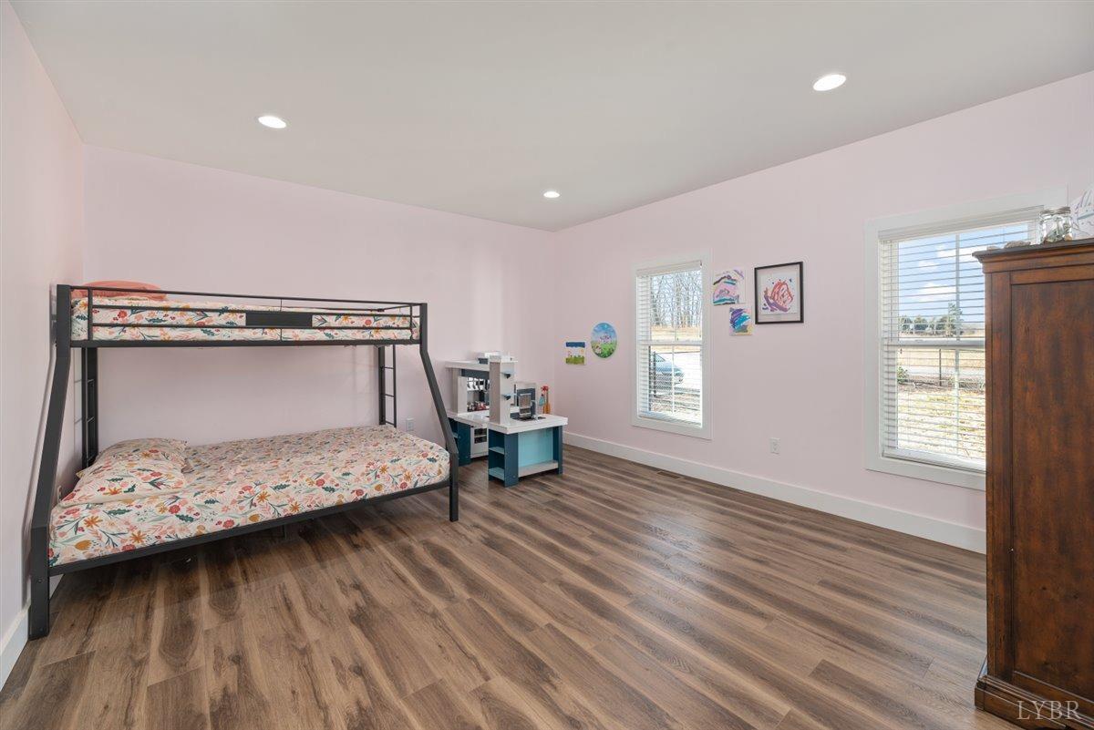 4639 Lowry Road Goode, VA 24556 - Photo 35 of 76 a bedroom with a bed and a window