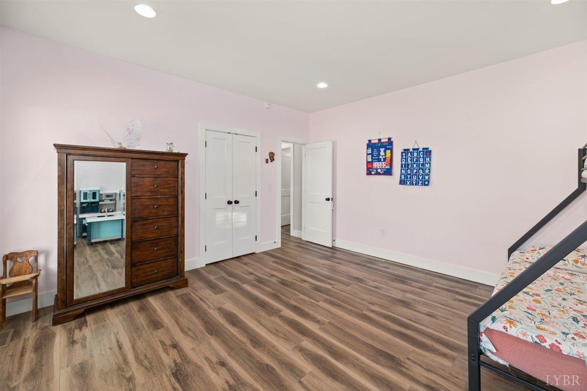 4639 Lowry Road Goode, VA 24556 - Photo 36 of 76 a view of empty room with wooden floor