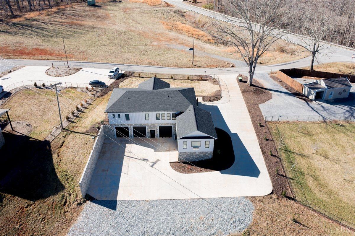4639 Lowry Road Goode, VA 24556 - Photo 63 of 76 a living room with furniture and a wooden floor