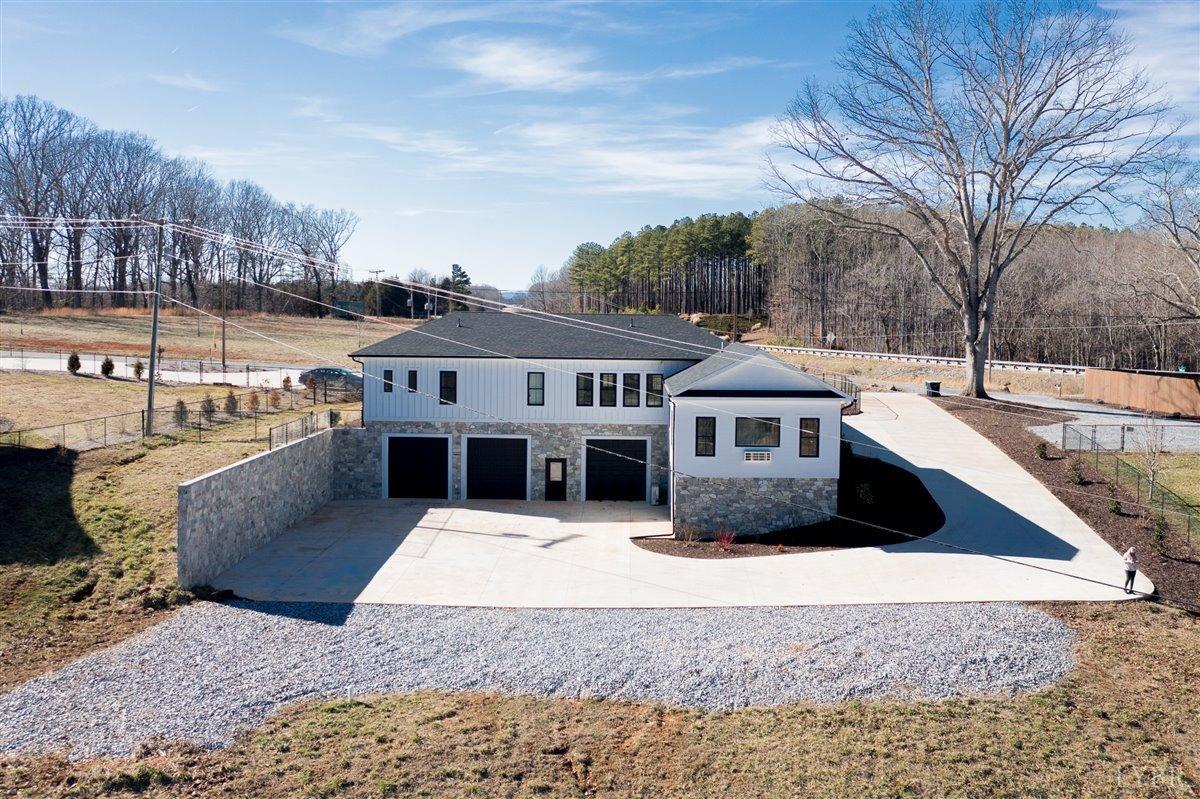 4639 Lowry Road Goode, VA 24556 - Photo 64 of 76 a view of a house with a yard