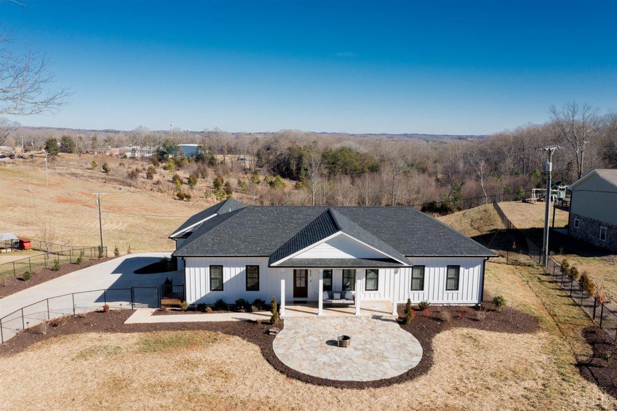 4639 Lowry Road Goode, VA 24556 - Photo 65 of 76 a front view of a house with a yard