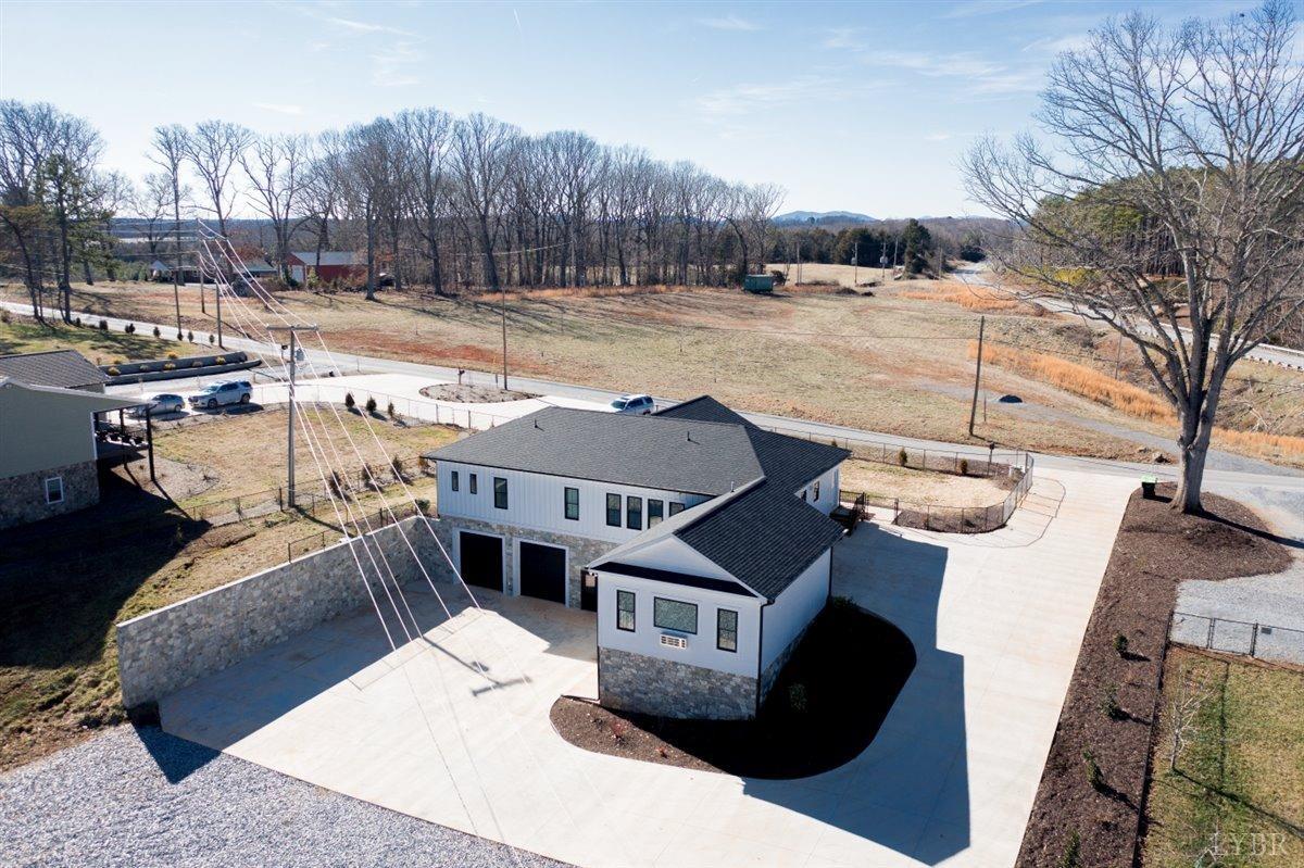 4639 Lowry Road Goode, VA 24556 - Photo 66 of 76 a view of a house with a yard and covered with snow