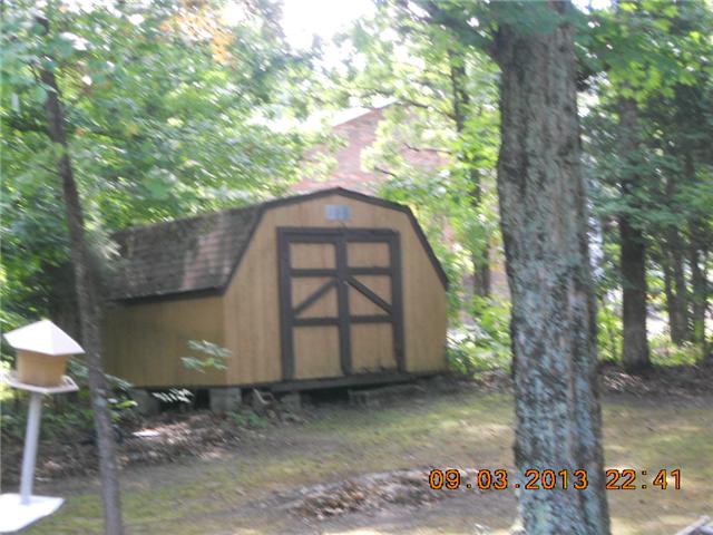 904 Woodhaven Road Lyles, TN 37098 - Photo 4 of 15 Large storage building in back yard.