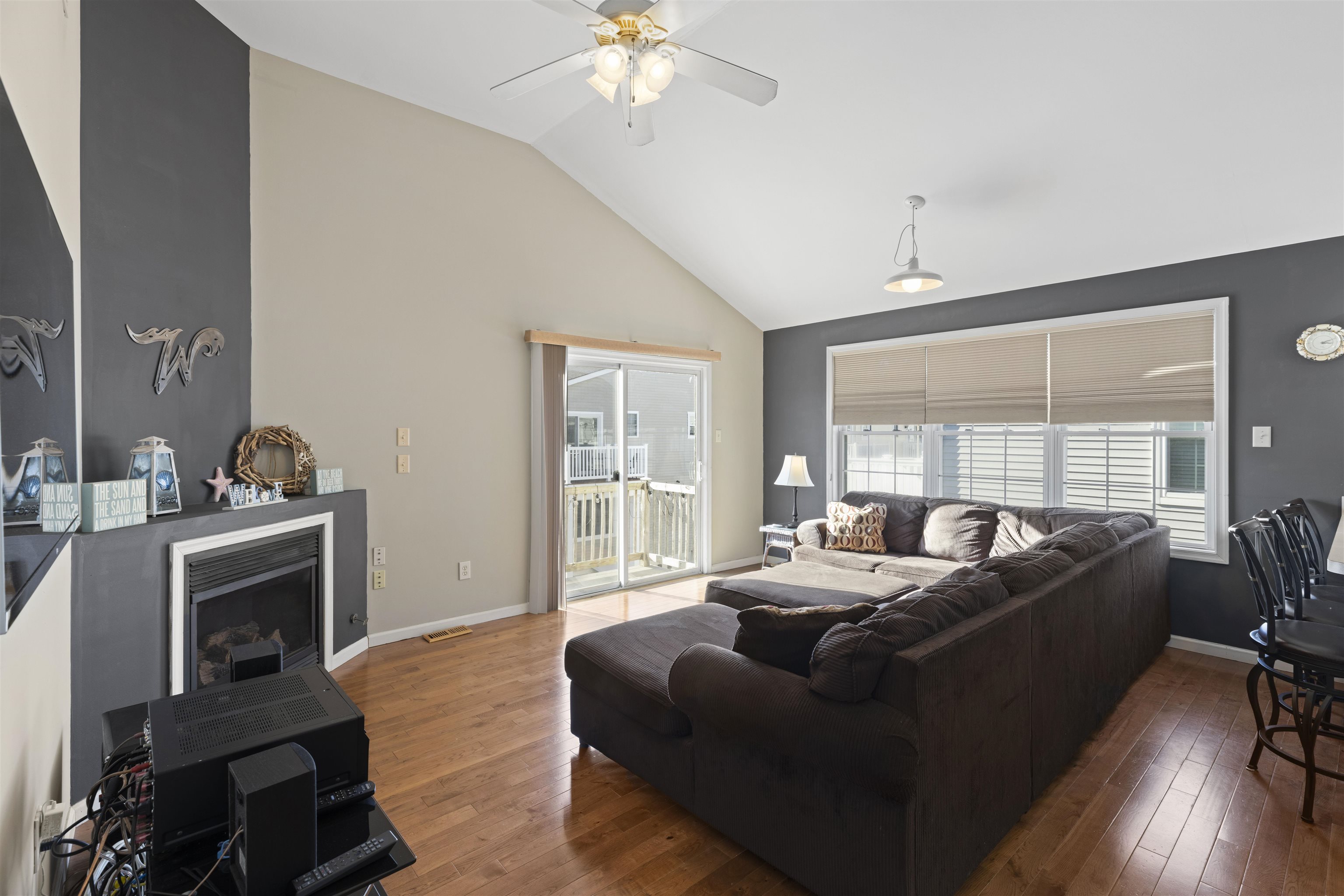 512 West Andrews Avenue, Unit B Wildwood, NJ 08260 - Photo 11 of 25 a living room with furniture and a fireplace