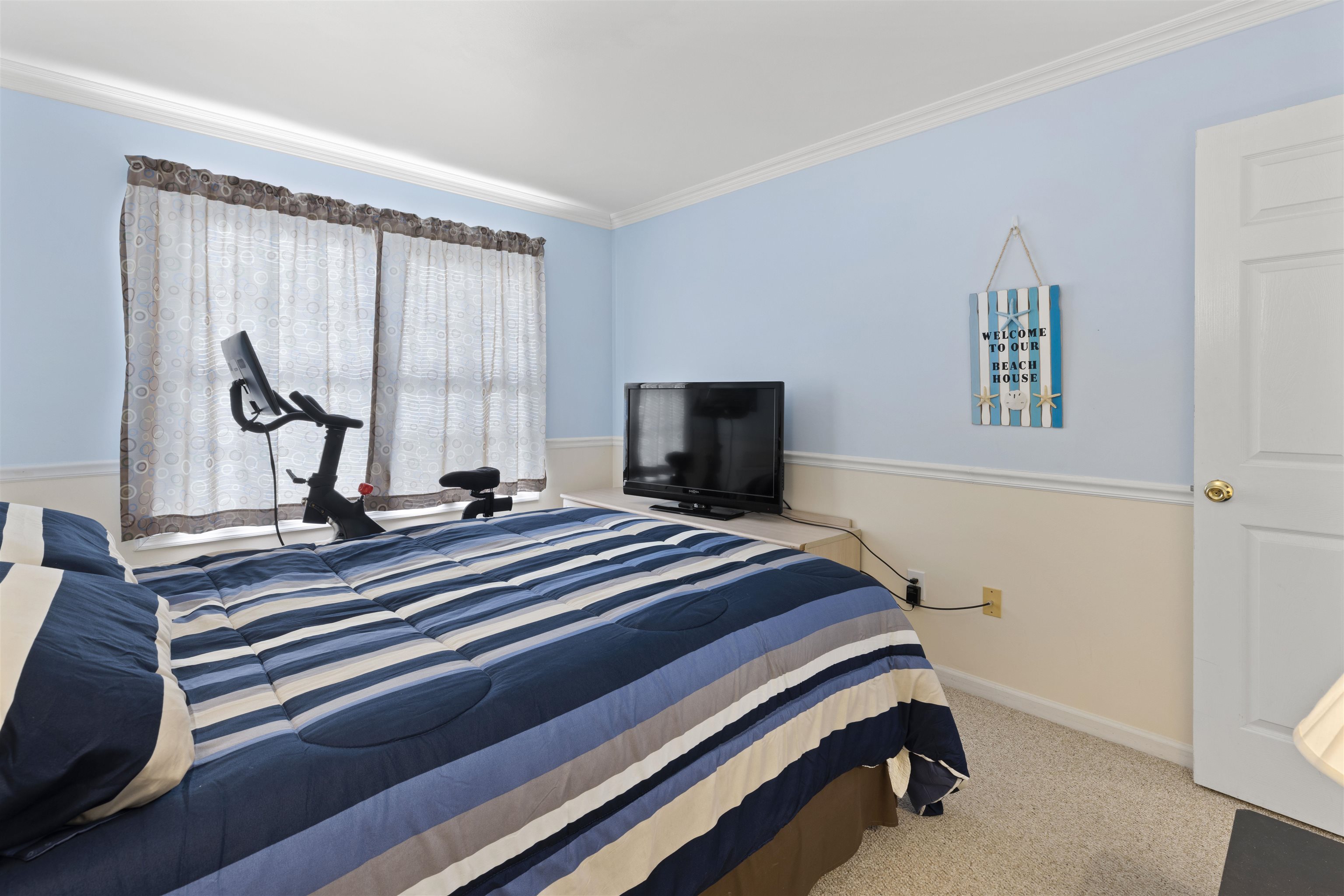 512 West Andrews Avenue, Unit B Wildwood, NJ 08260 - Photo 14 of 25 a bedroom with a bed and a window