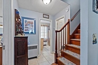 121 Brandon Avenue Springfield, MA 01119 - Photo 12 of 27 a view of entryway and hall with dining room