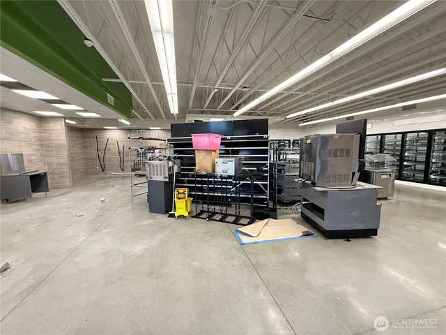 a room with furniture and flat screen tv