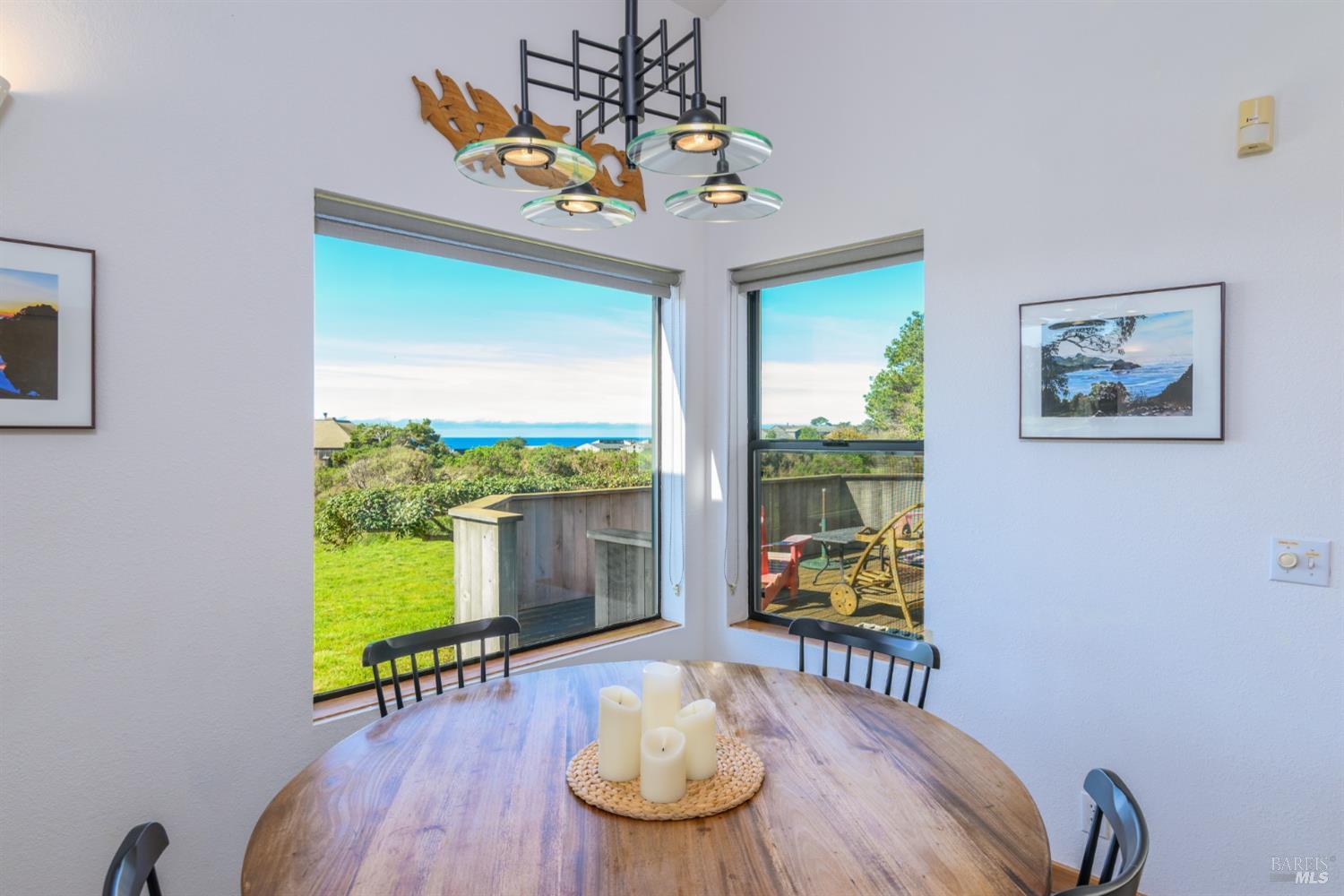 39722 Leeward Road, Unit 28 The Sea Ranch, CA 95497 - Photo 11 of 30 a view of a dining room with furniture window and wooden floor
