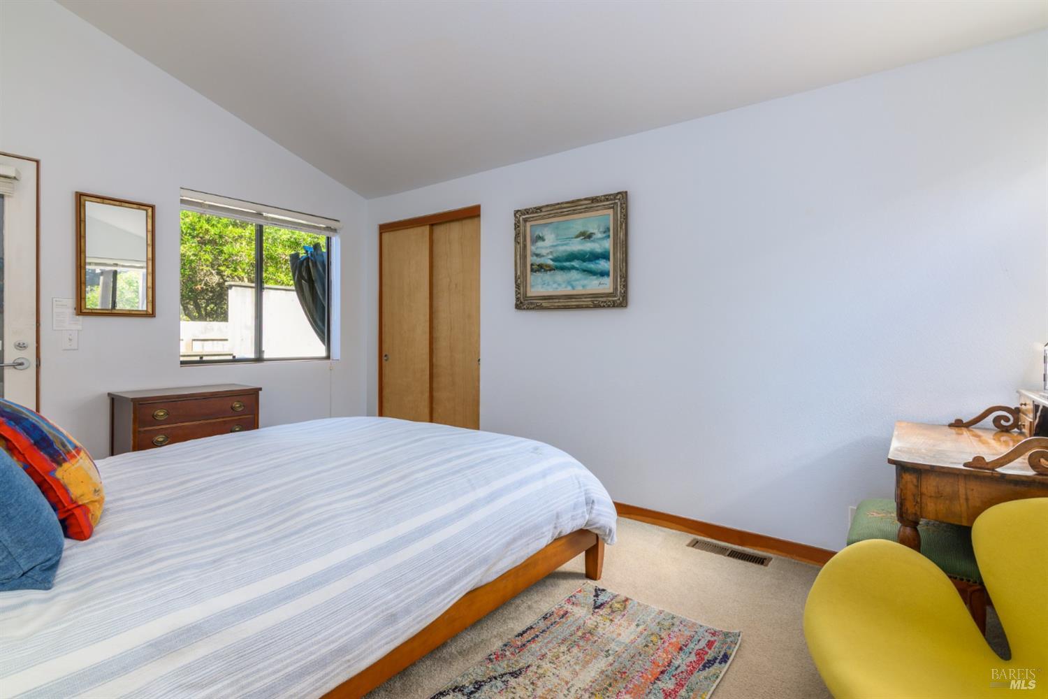 39722 Leeward Road, Unit 28 The Sea Ranch, CA 95497 - Photo 16 of 30 a bedroom with a bed and a window