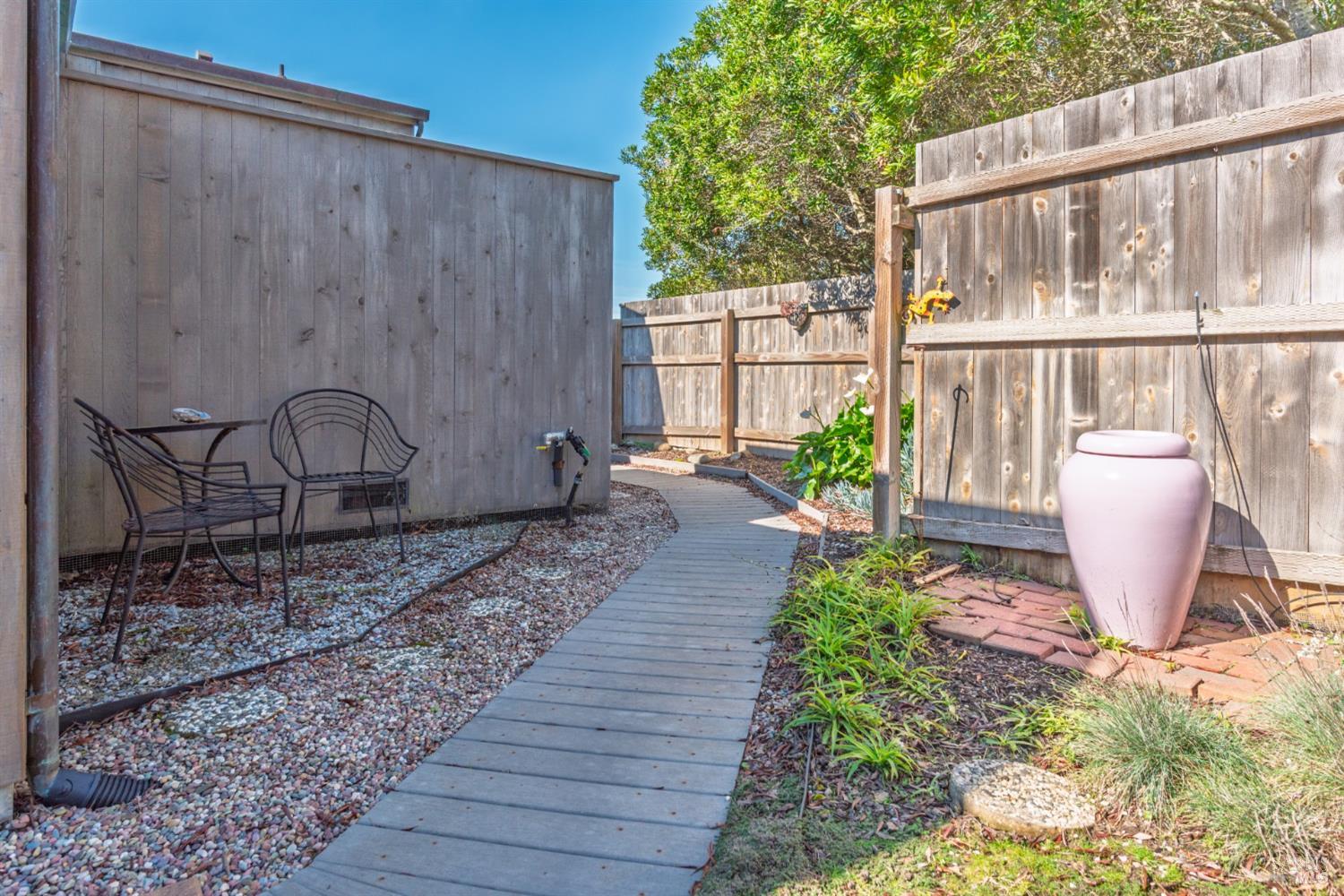 39722 Leeward Road, Unit 28 The Sea Ranch, CA 95497 - Photo 23 of 30 a view of a house with a yard