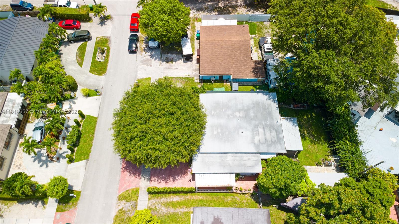 7110 Southwest 13th Terrace Miami, FL 33144 - Photo 12 of 48 an aerial view of residential house with outdoor space and swimming pool