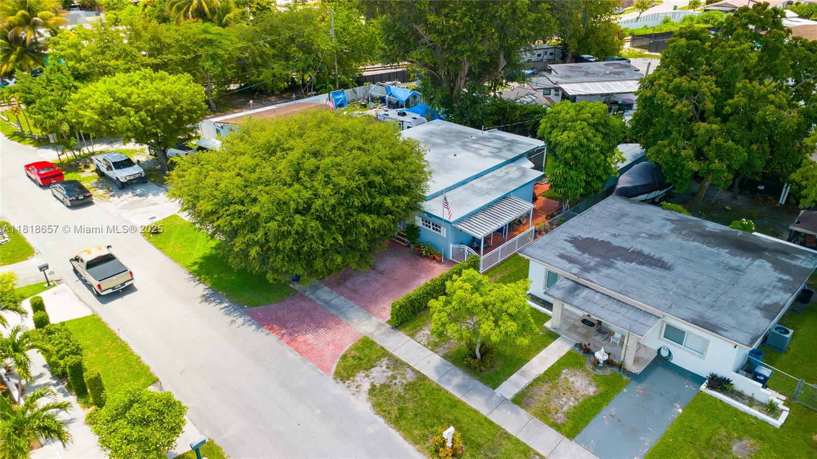 7110 Southwest 13th Terrace Miami, FL 33144 - Photo 13 of 48 an aerial view of a house with a garden