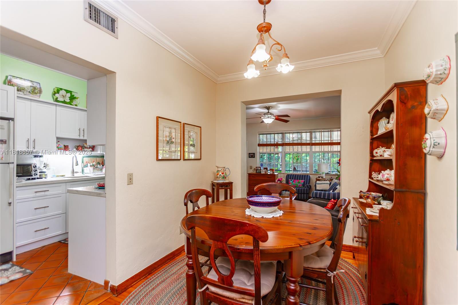 7110 Southwest 13th Terrace Miami, FL 33144 - Photo 18 of 48 a dining room with furniture and window