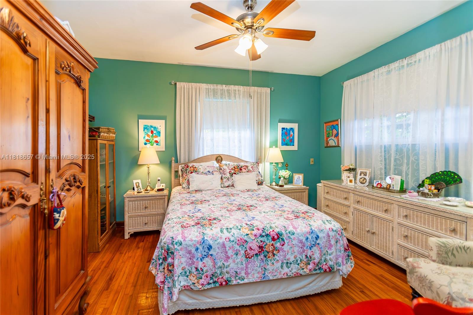 7110 Southwest 13th Terrace Miami, FL 33144 - Photo 27 of 48 a bedroom with a bed mirror and a window