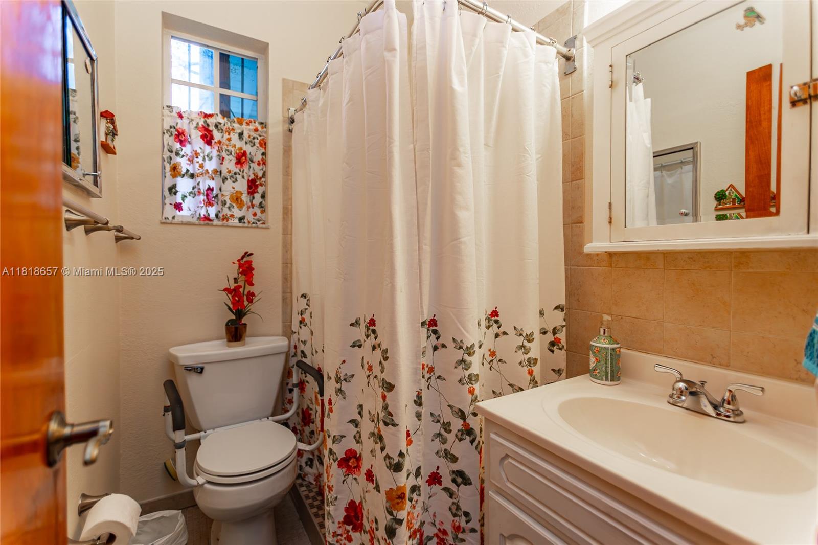 7110 Southwest 13th Terrace Miami, FL 33144 - Photo 30 of 48 a bathroom with a sink toilet and shower