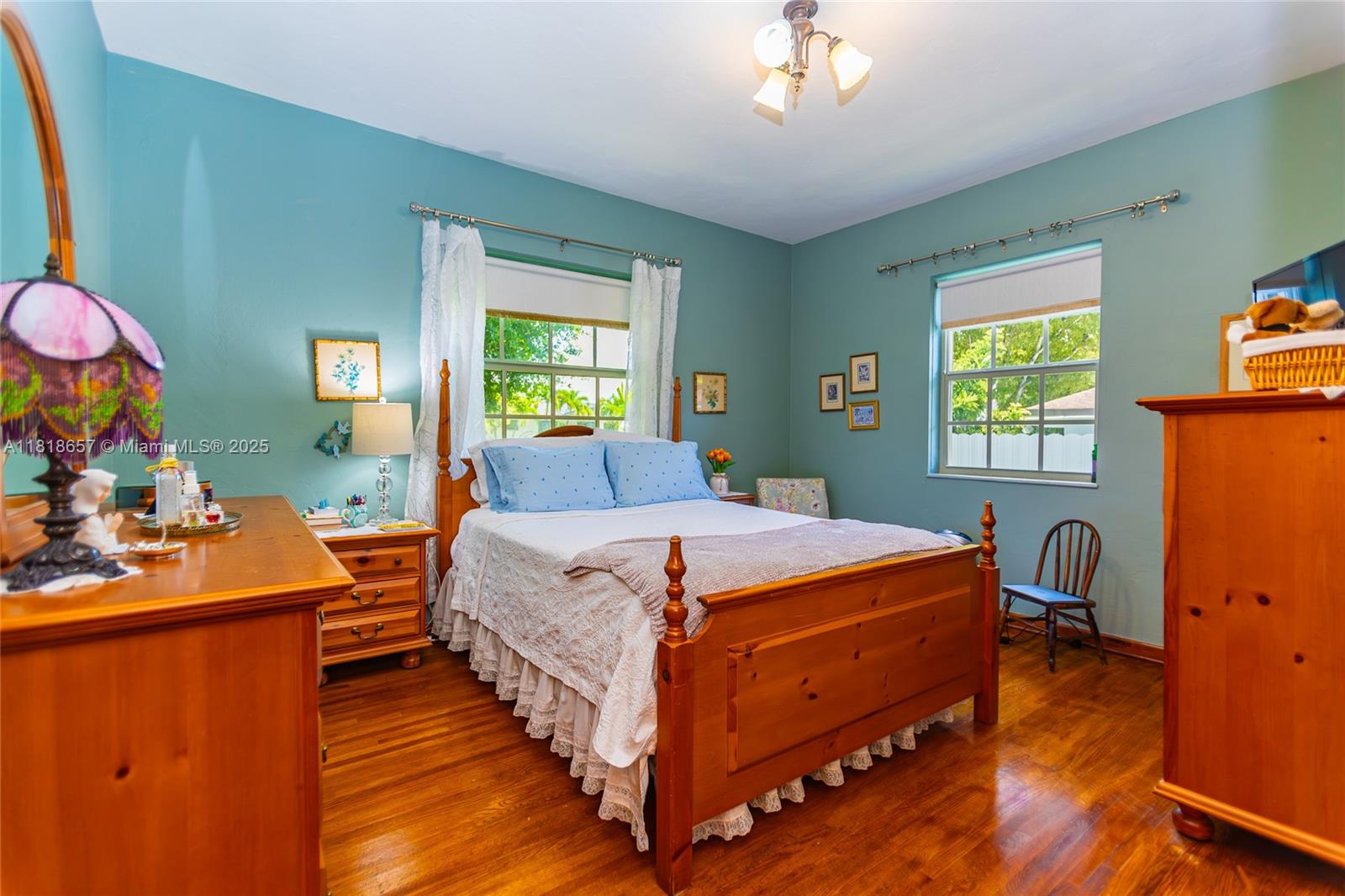 7110 Southwest 13th Terrace Miami, FL 33144 - Photo 33 of 48 a bedroom with bed and window