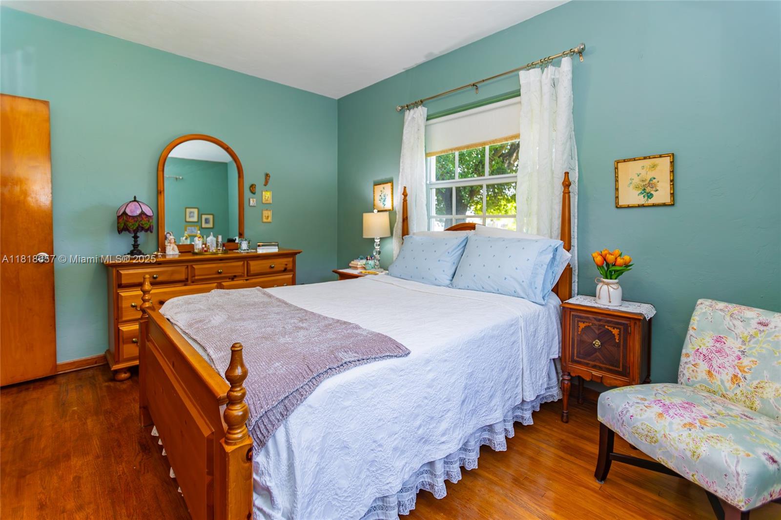 7110 Southwest 13th Terrace Miami, FL 33144 - Photo 34 of 48 a bedroom with bed and window